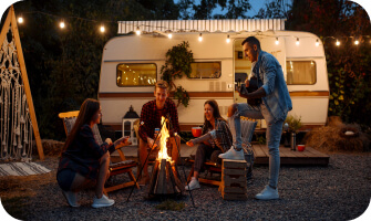 people sitting around a fire
